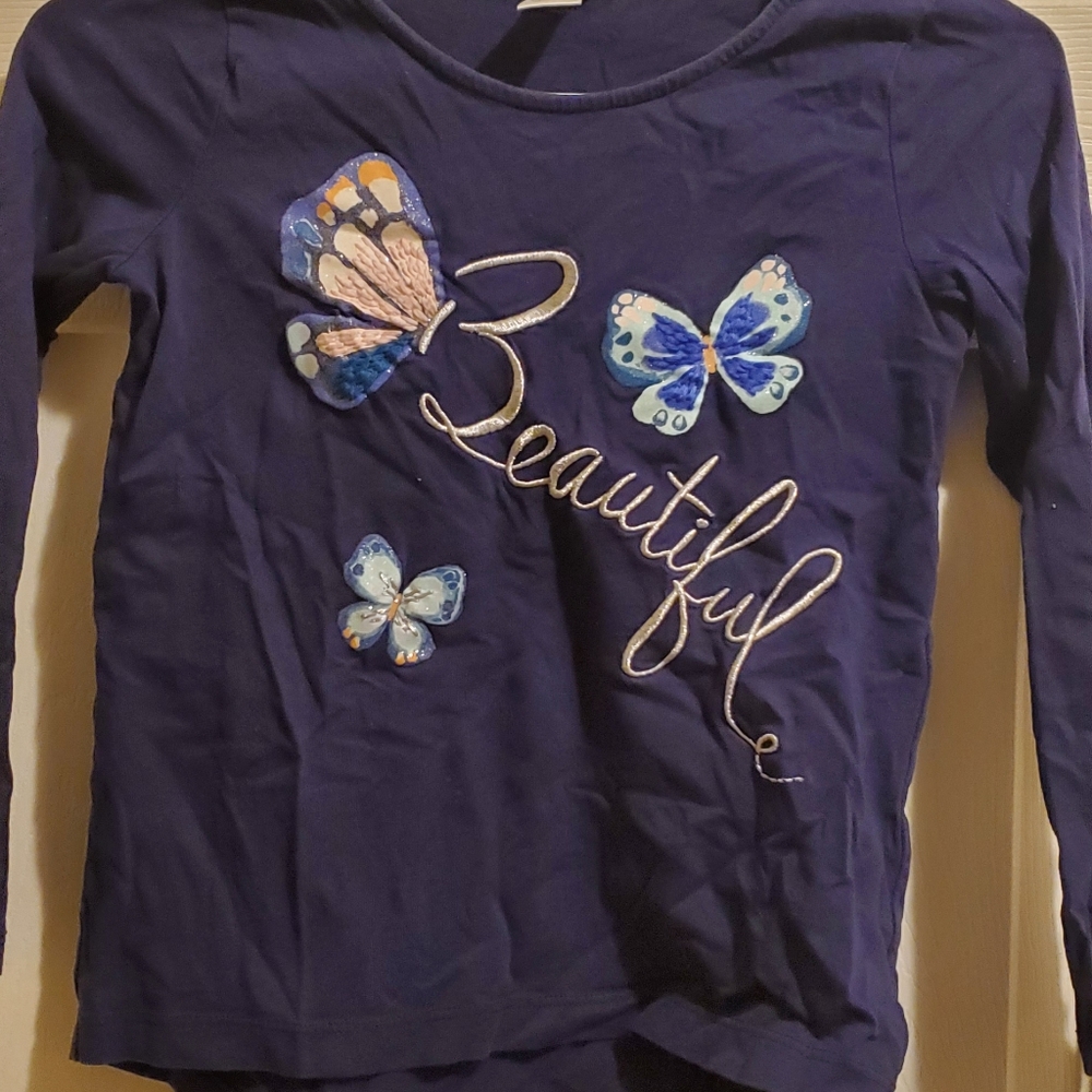 Girls navy blue long sleeve shirt.